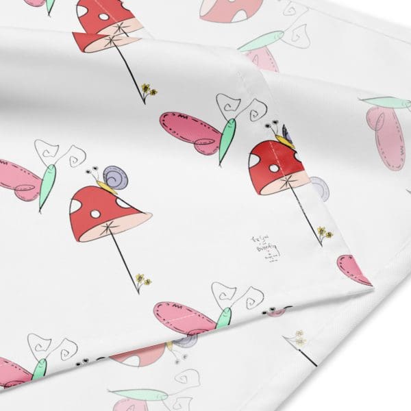 Folded Snail & Butterfly eco-friendly bandana showcasing the vibrant and whimsical book characters.