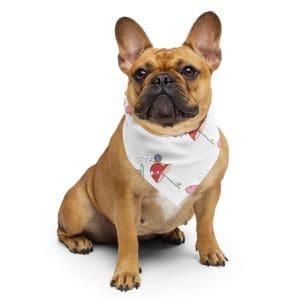 Adorable pet wearing the Snail & Butterfly eco-friendly bandana, featuring vibrant characters from the children's book